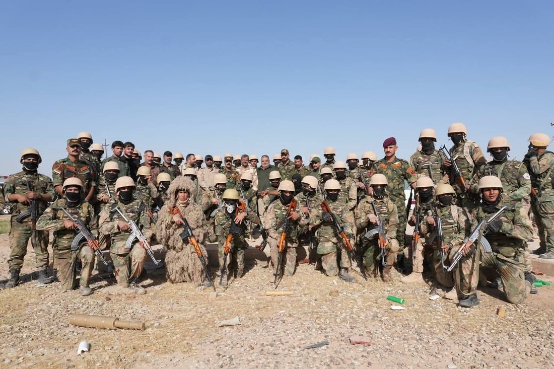 صور: قوات خاصة من الحشد الشعبي تجري تمريناً بالذخيرة الحية