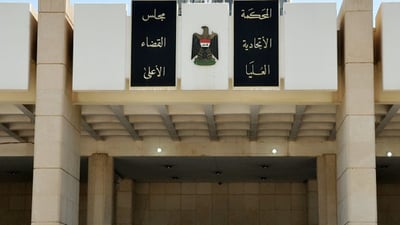 Iraq’s top court resumes work under new leadership after judges withdraw resignations
