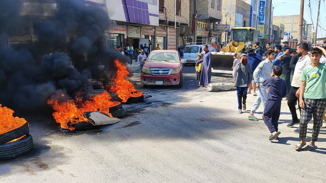 Nasiriyah protestors block main roads with burning tires