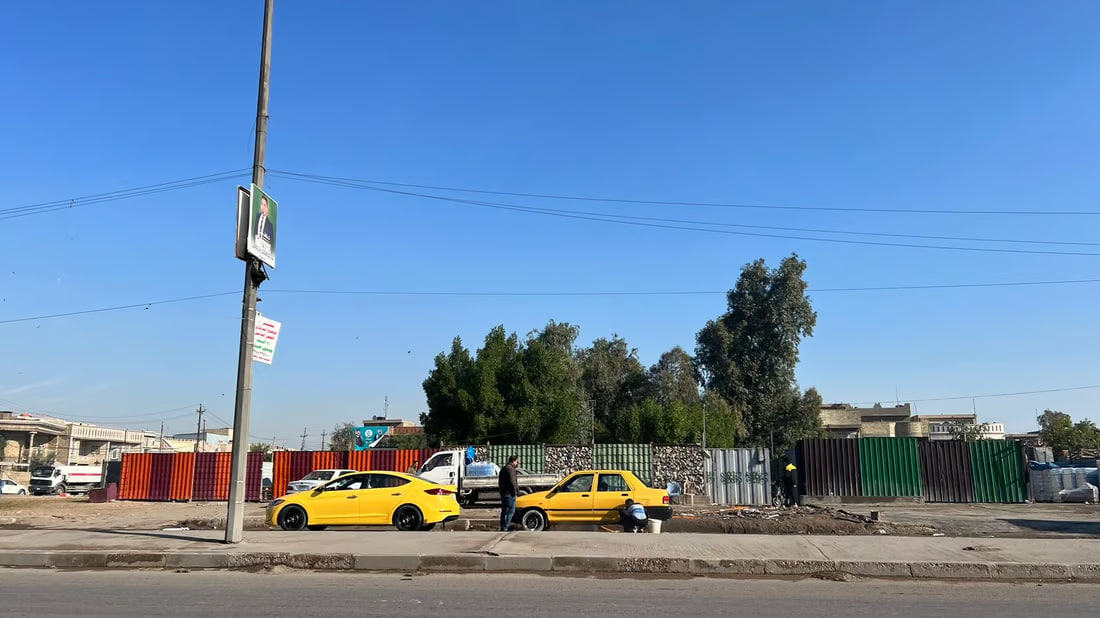 Illegal car washes flourish in Baghdad’s Al-Baladiyat district