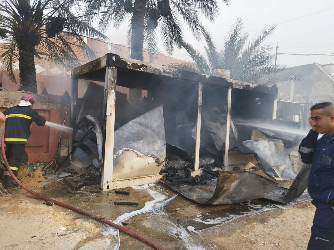 صور من الحلة قبل قليل: النيران تلتهم كرفاناً لحماية منزل قائد أمني