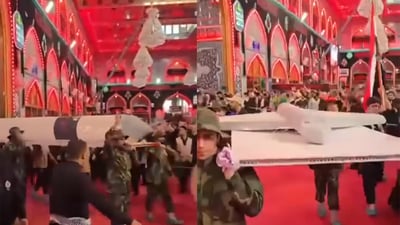 Badr Organization parades Iranian missile replicas inside Imam Hussein shrine in Karbala