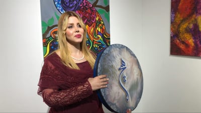 Video: Meet Jina Khulqi as she plays the daf at a women’s art exhibition