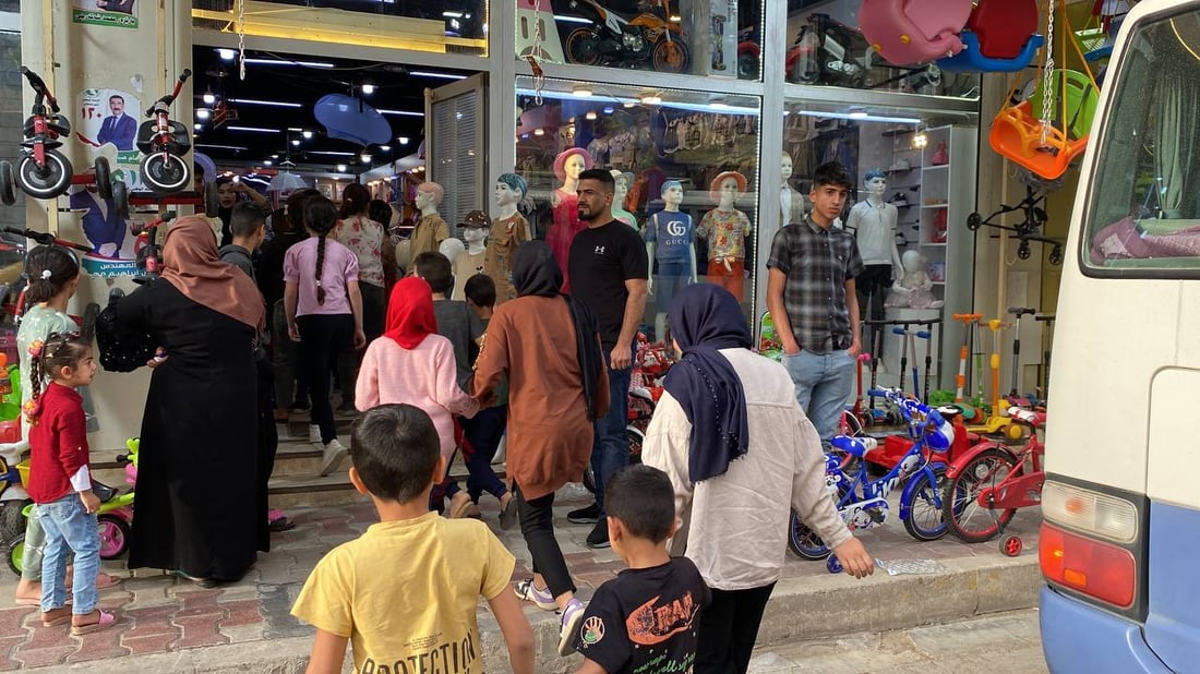 لە خانەقین جلوبەرگی جەژن بۆ منداڵانی بێ باوک دابینکرا