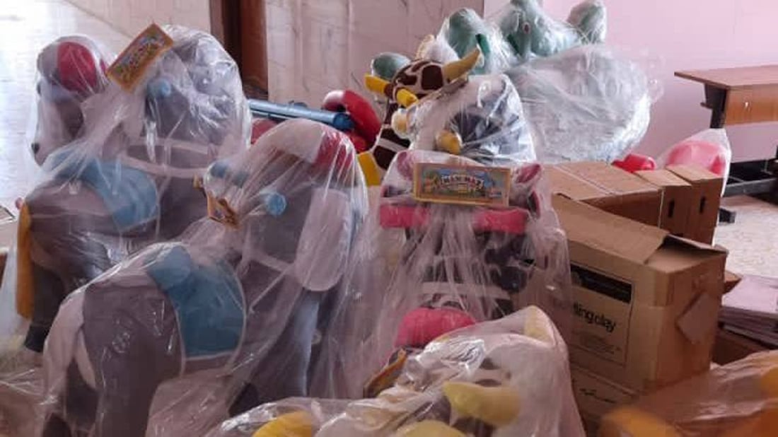 صور: عملاق النفط الروسي يوزع الألعاب على أطفال البصرة