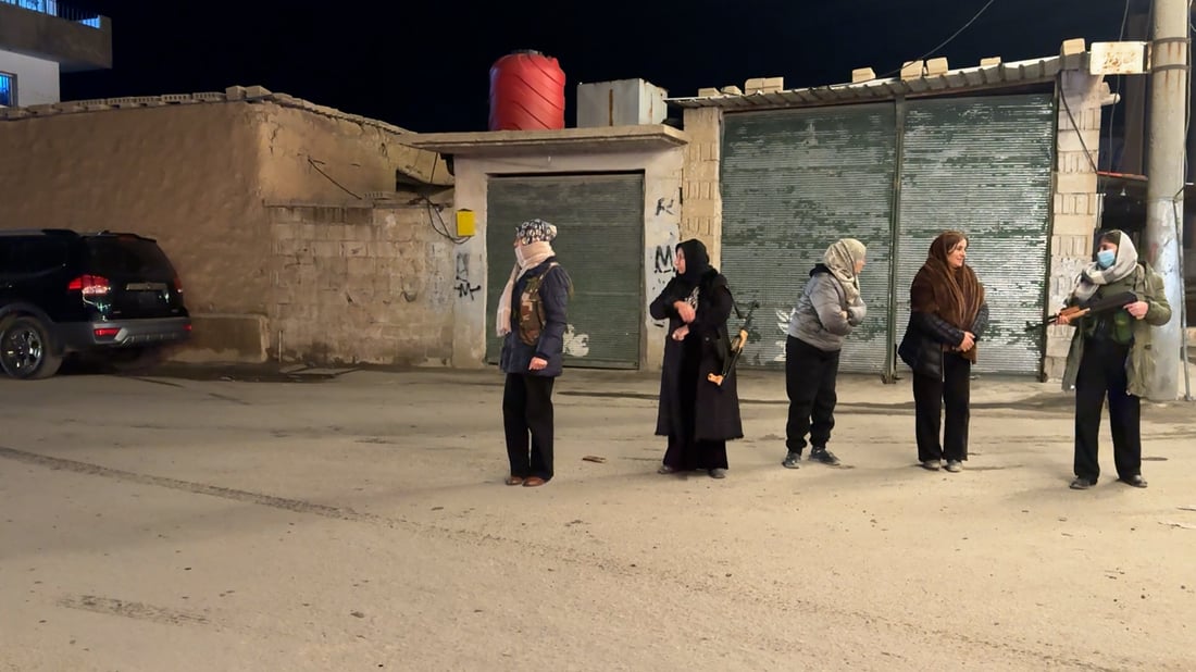Women in Amuda patrol streets as Rojava mobilizes