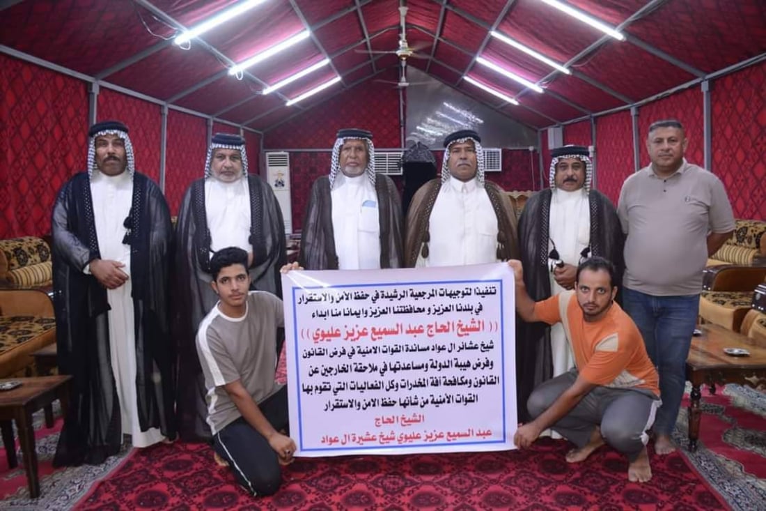 شرطة الناصرية ترد على التظاهرات بلافتات من مضايف الشيوخ.. “العشائر معنا” (صور)