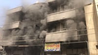 صور: الدفاع المدني يخمد حريقاً اندلع داخل بناية تجارية ...