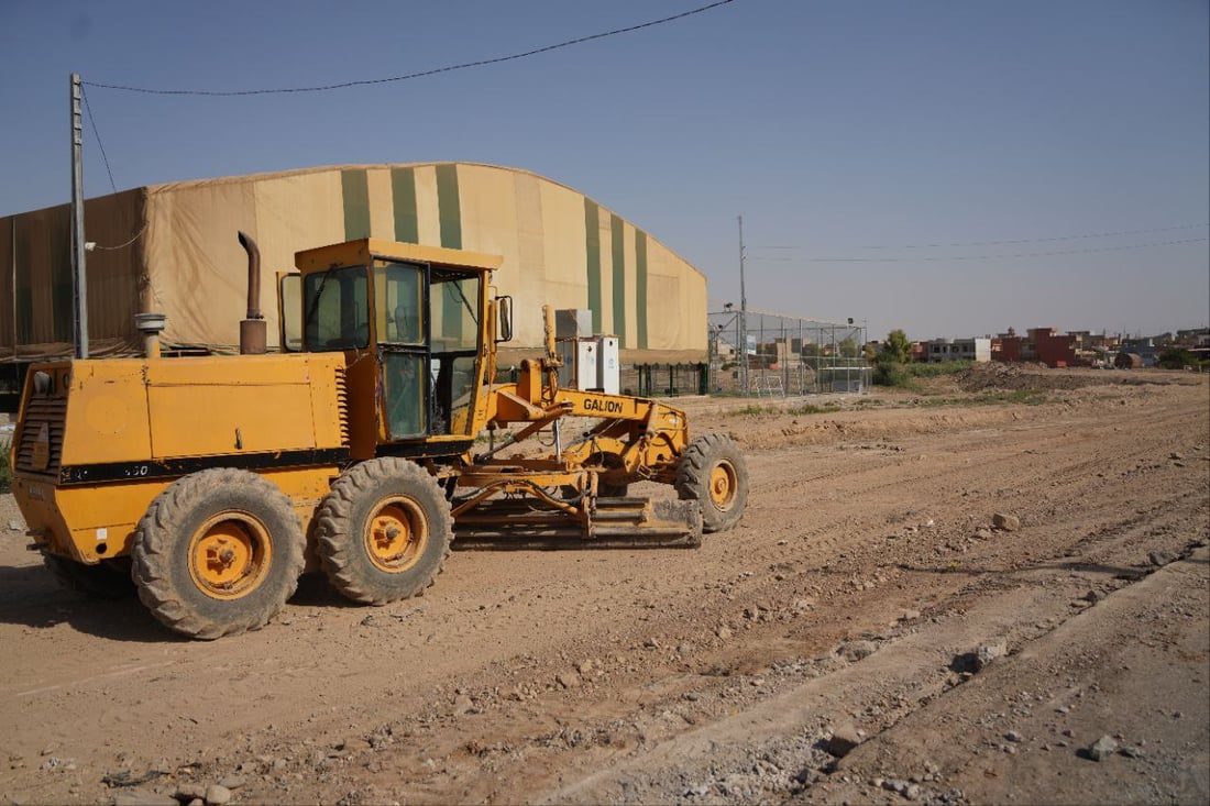 بالصور ..الأسفلت يكسو شارع السدة في قضاء الحمدانية