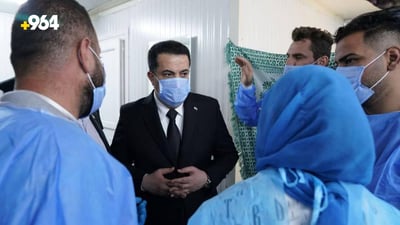 Sudani visits Hamdaniya wedding fire victims and families