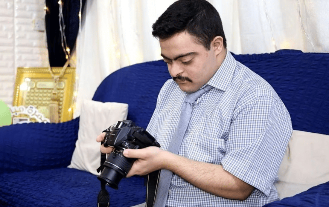Kut man overcomes challenges with Down Syndrome through photography