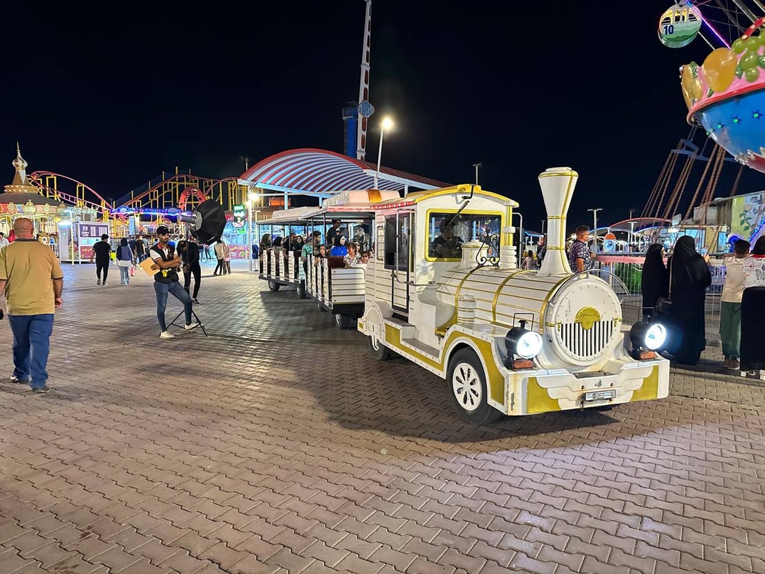 عيد البصرة.. عوائل كويتية تشارك العراقيين السمر حتى منتصف الليل في “هابي لاند” (صور)