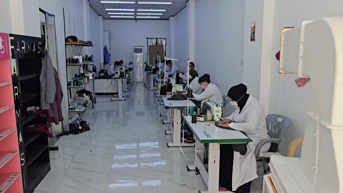 Factory in Mosul produces thousands of medical scrubs each month