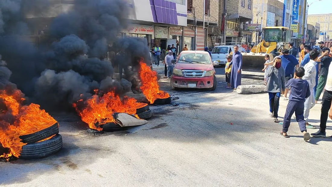Nasiriyah protestors block main roads with burning tires
