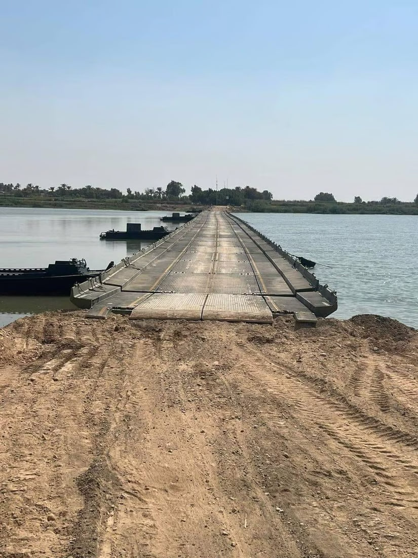 Military bears load of temporary bridge in Numaniyah