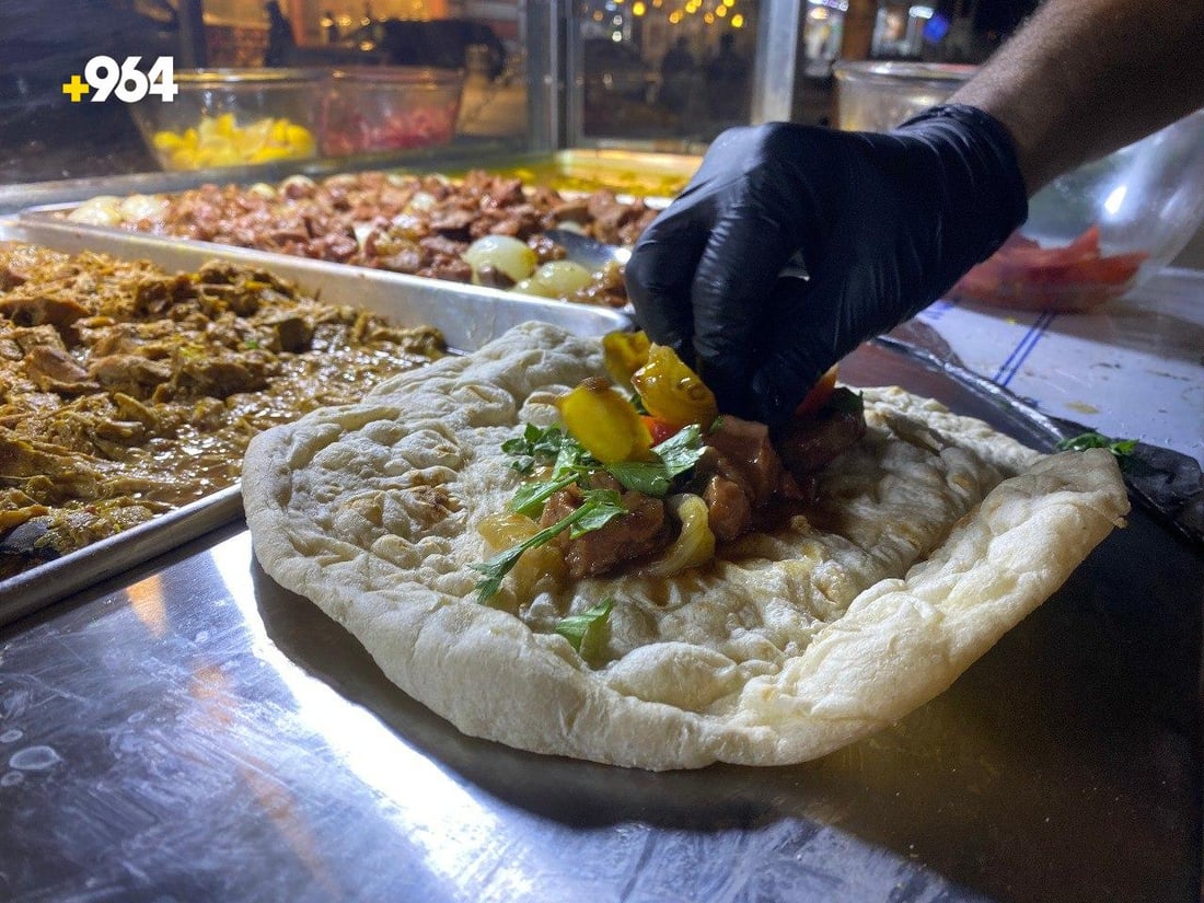 صور: أكلات شوارع أربيل وصلت إلى العمارة.. نقلها طبيب شاب مع أصدقائه