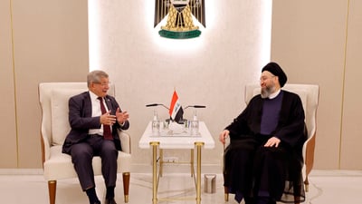 Hakim calls for stronger Turkey ties, says all weapons must come under state control