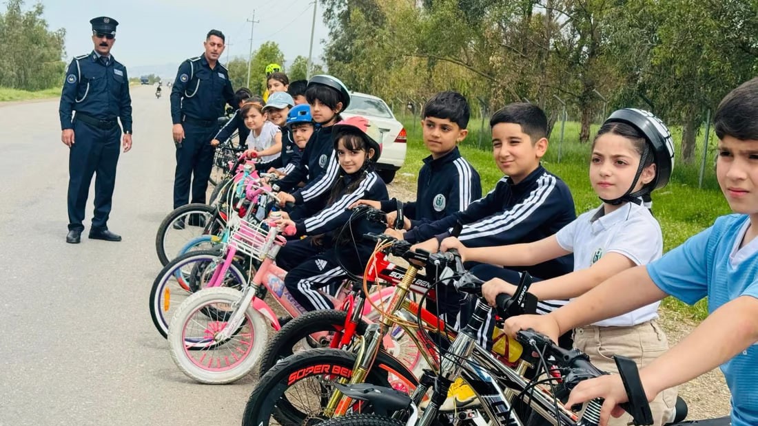 صور: ماراثون دراجات للأطفال في السليمانية بإشراف شرطة المرور