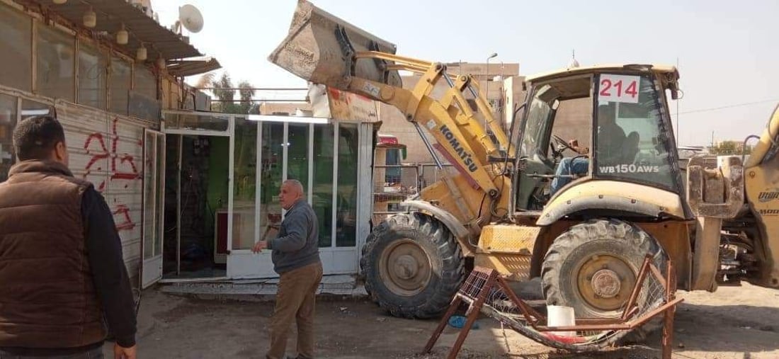 صور: التجاوزات تخنق شوارع الحلة واتهامات حكومية لمتنفذين بإفشال حملات الإزالة