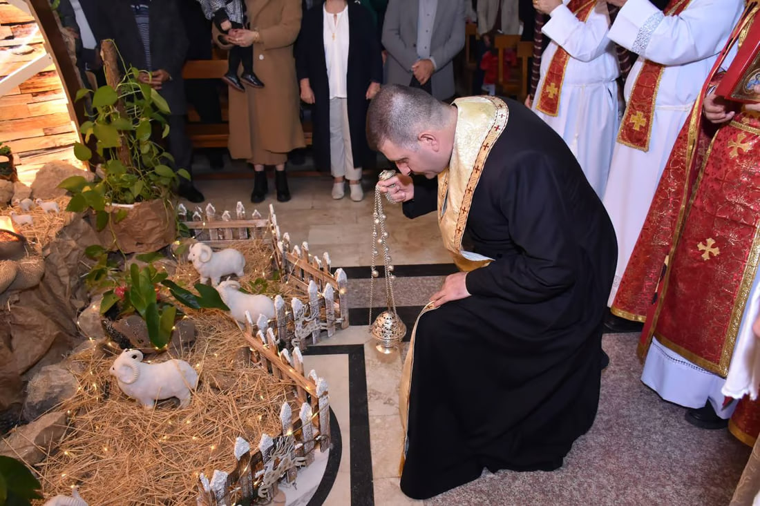 Photos: Somber Christmas Mass in Hamdaniya