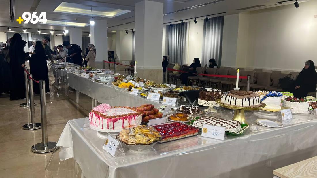 Iranian women in Baghdad showcase culinary skills in traditional cooking competition