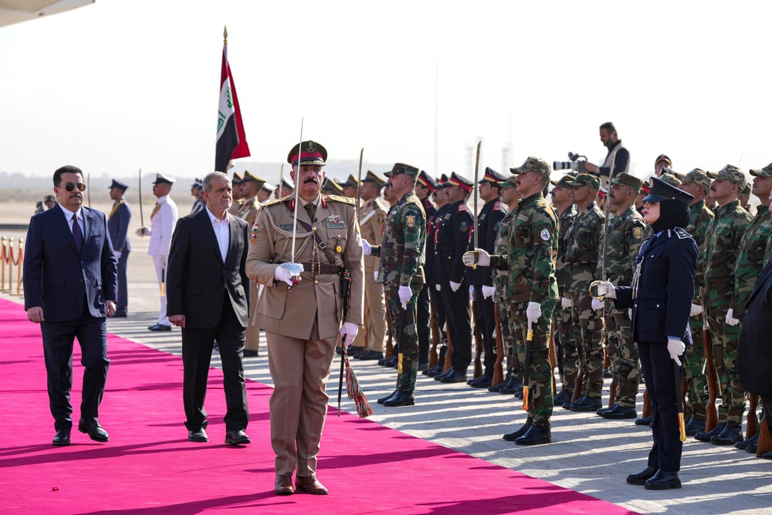 صور من الاستقبال الرسمي للرئيس الإيراني في بغداد