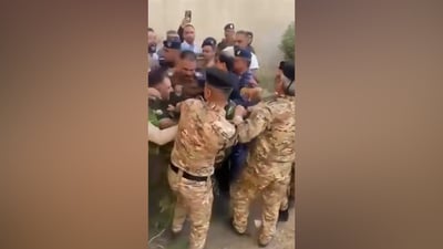 Baghdad weather authority workers block director in protest over alleged abuse, misconduct