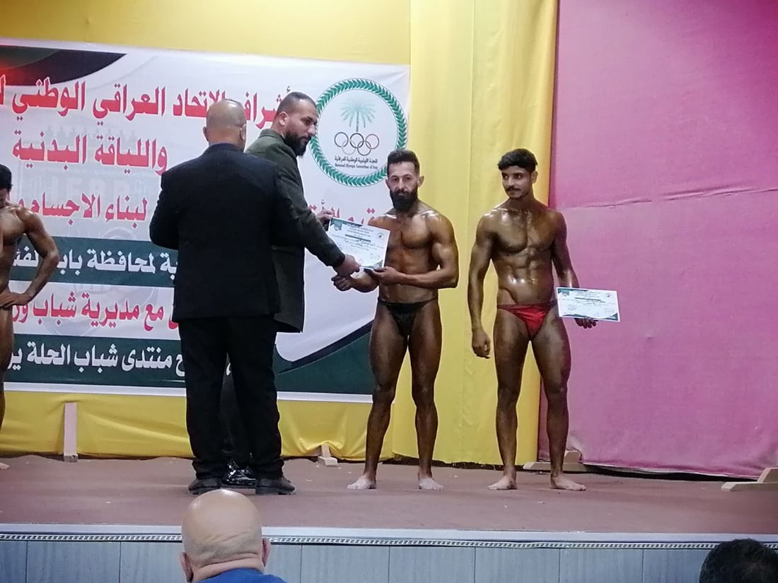 صور: بابل تستعرض “عضلاتها” بـ60 لاعباً.. أندية كمال الأجسام تتنافس على المنتخب