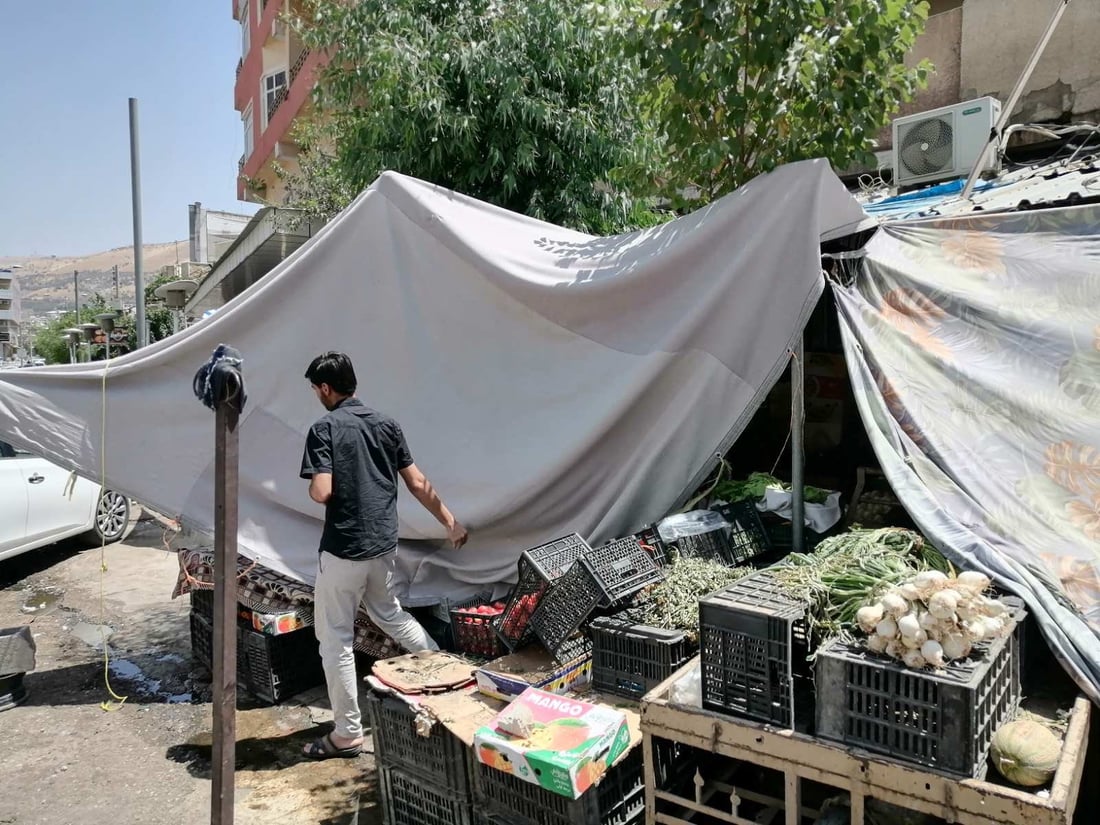 میوەفرۆشەکانی سەرشەقامی چوارچرای نوێ لە سلێمانی لابران 