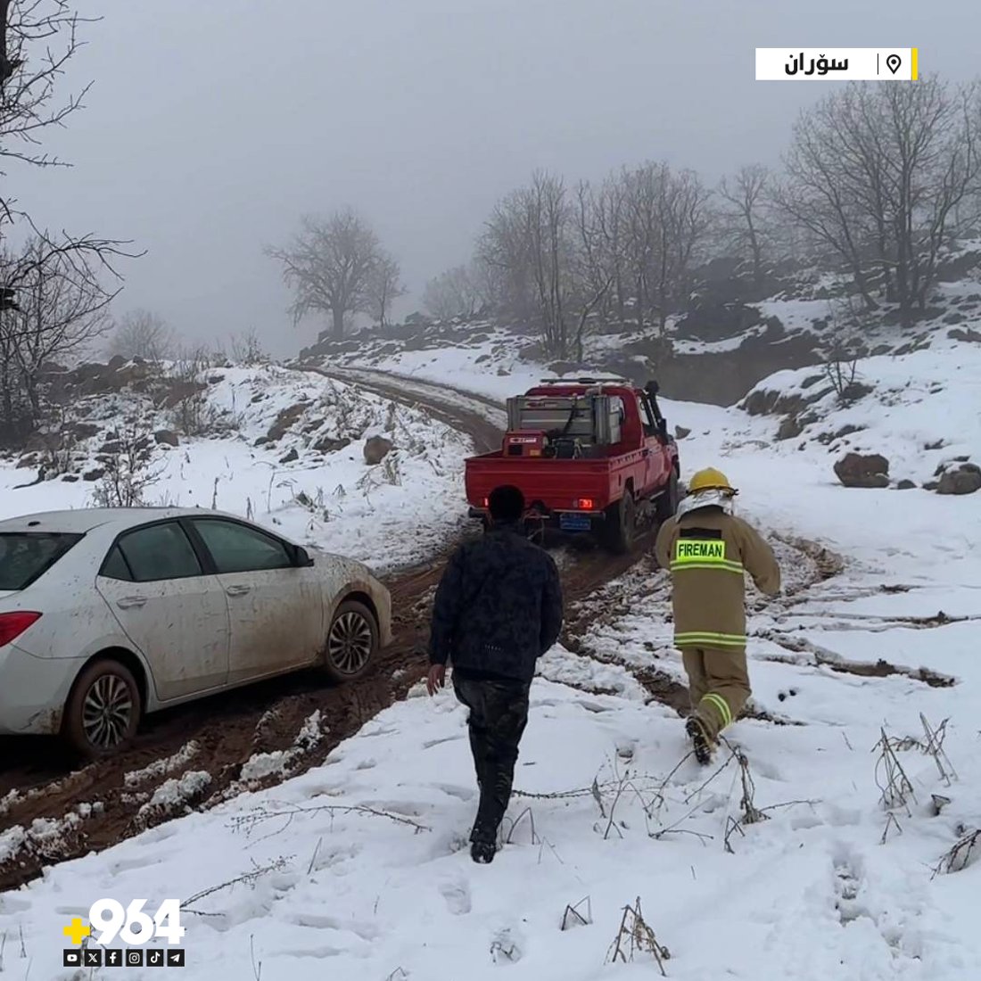 هاوڵاتییەک بە ئۆتۆمبێلەکەیەوە لەناو بەفر رزگارکرا