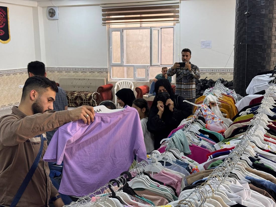 لە خانەقین منداڵانی بێباوک و کەمدەرامەت جلی جەژنیان وەرگرت