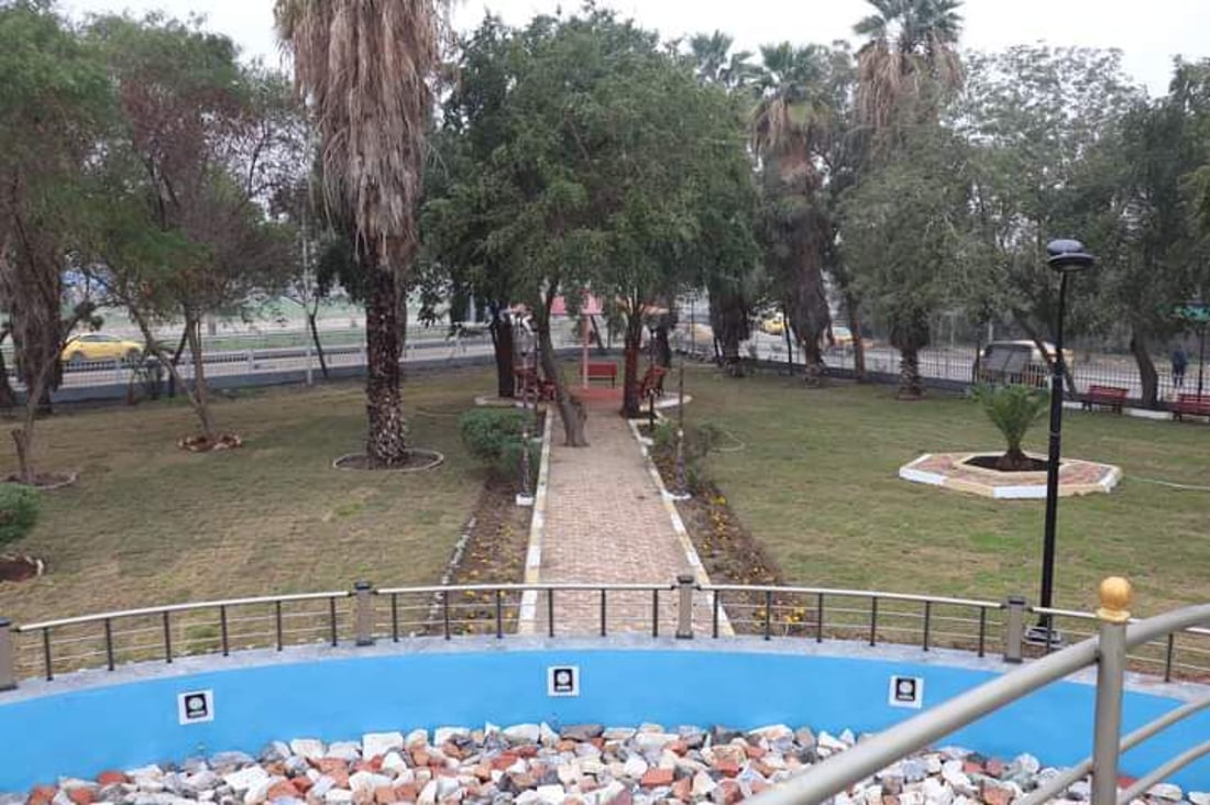 صور: حدائق شرقي بغداد تتنفس بأشجار جديدة وأزهار موسمية