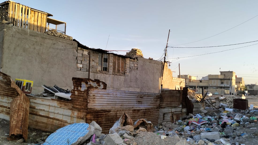 صور: هذه المنطقة البغدادية خارج الحياة منذ 20 سنة.. مختار الولداية يتحدث لفريق 964