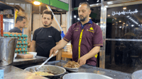 3 رجال مرور لتنظيم ازدحام النجف على الباقلاء بالدهن عند...