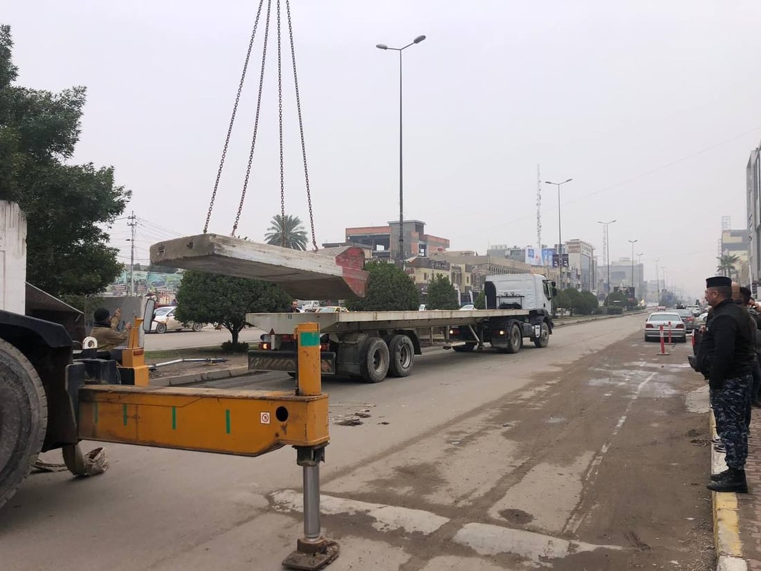 صور: رفع الصبات الكونكريتية من سيطرتي اللقاء والجامعة في بغداد