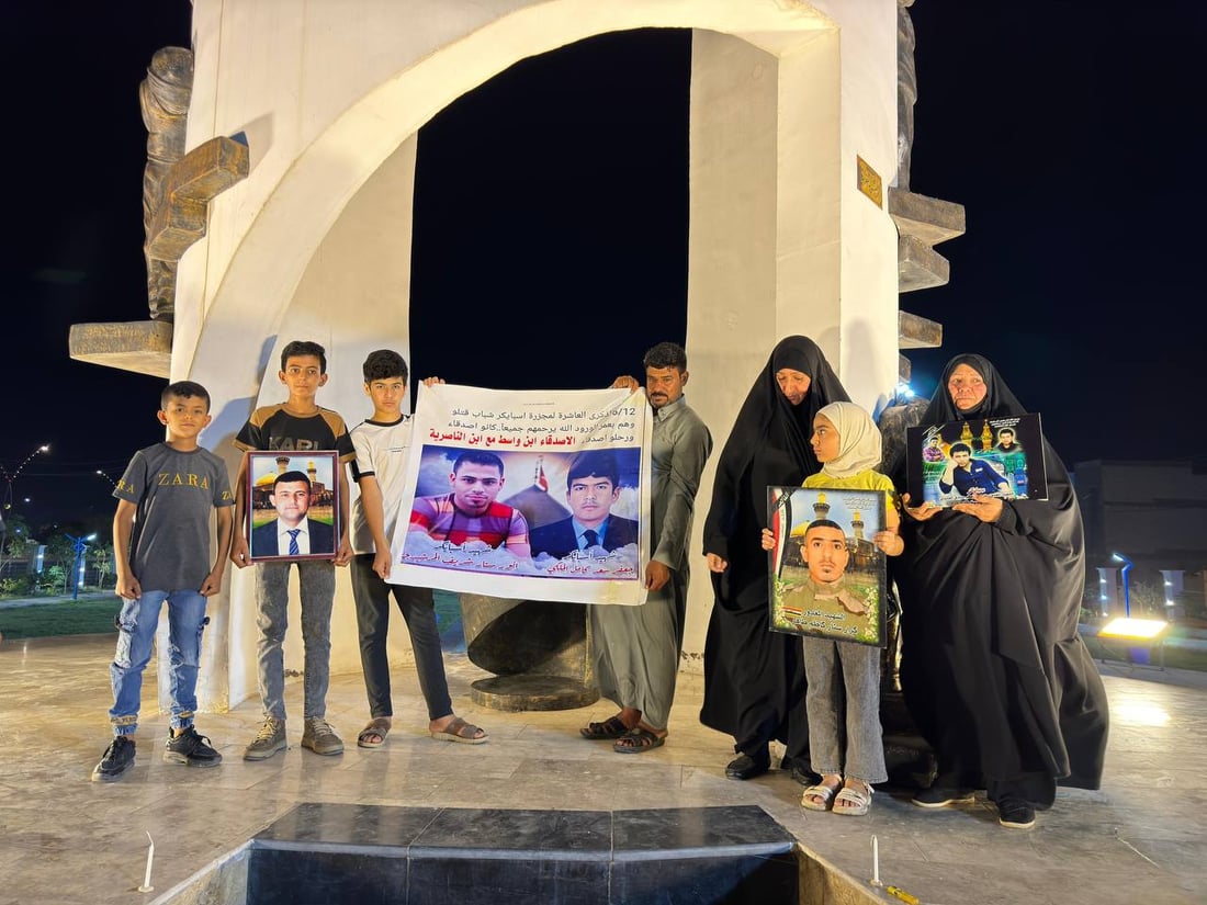 صور من الكوت: شموع وحزن حول نصب سبايكر في ذكرى المجزرة الأليمة