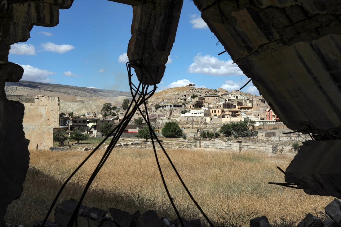 Buildings damaged during the 2014 attack by Islamic State. May 6, 2024 (Photo by Safin HAMID / AFP)