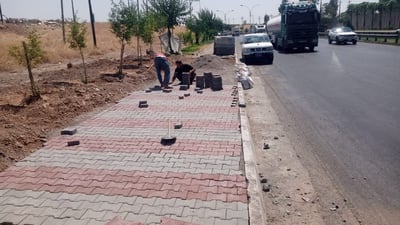 بەشێكی شەقامی 100 مەتری چاككرا و كربستۆن لە دارەتوو دانرا