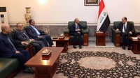 حسن توران يصطحب راكان الجبوري للقاء المالكي في بغداد