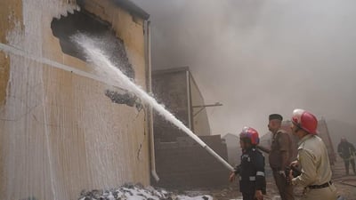 Civil defense extinguishes large fire at electrical storage facility in Baghdad