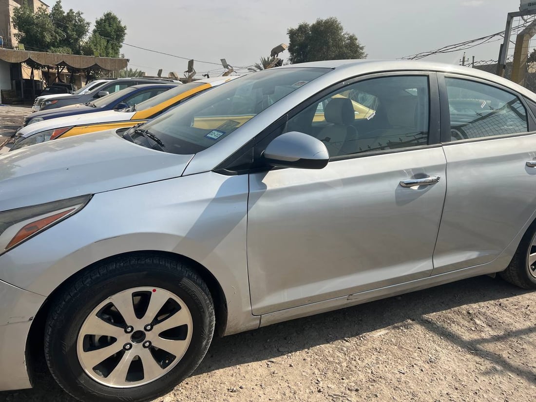 حملة تواقيع برلمانية على الدولار تشل معارض السيارات في بغداد (صور)