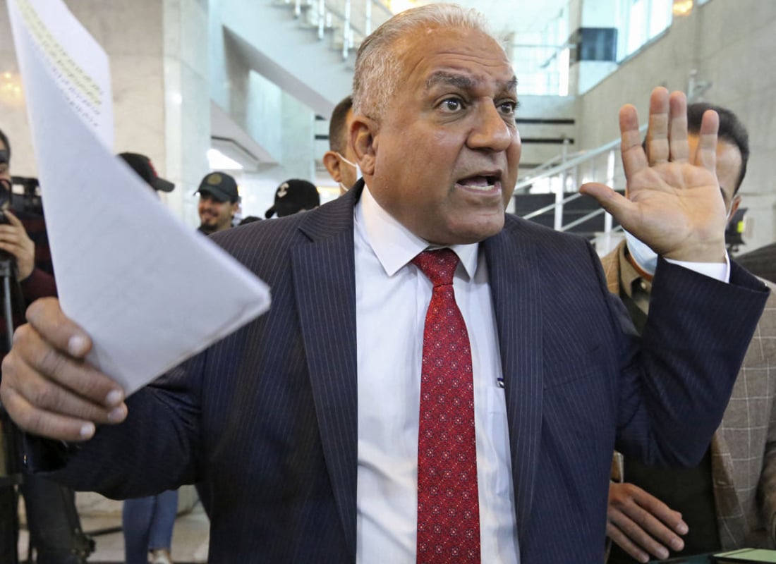 Iraqi deputy Basem Khashan reacts during a court session on the subject of the constitutionality of the first Parliamentary session at the Supreme Judicial Council in the Iraqi capital Baghdad on January 25, 2022. (Photo by Sabah ARAR / AFP) (Photo by SABAH ARAR/AFP via Getty Images)