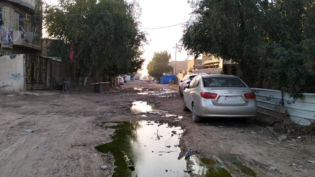صور: هذه المنطقة البغدادية خارج الحياة منذ 20 سنة.. مختار الولداية يتحدث لفريق 964