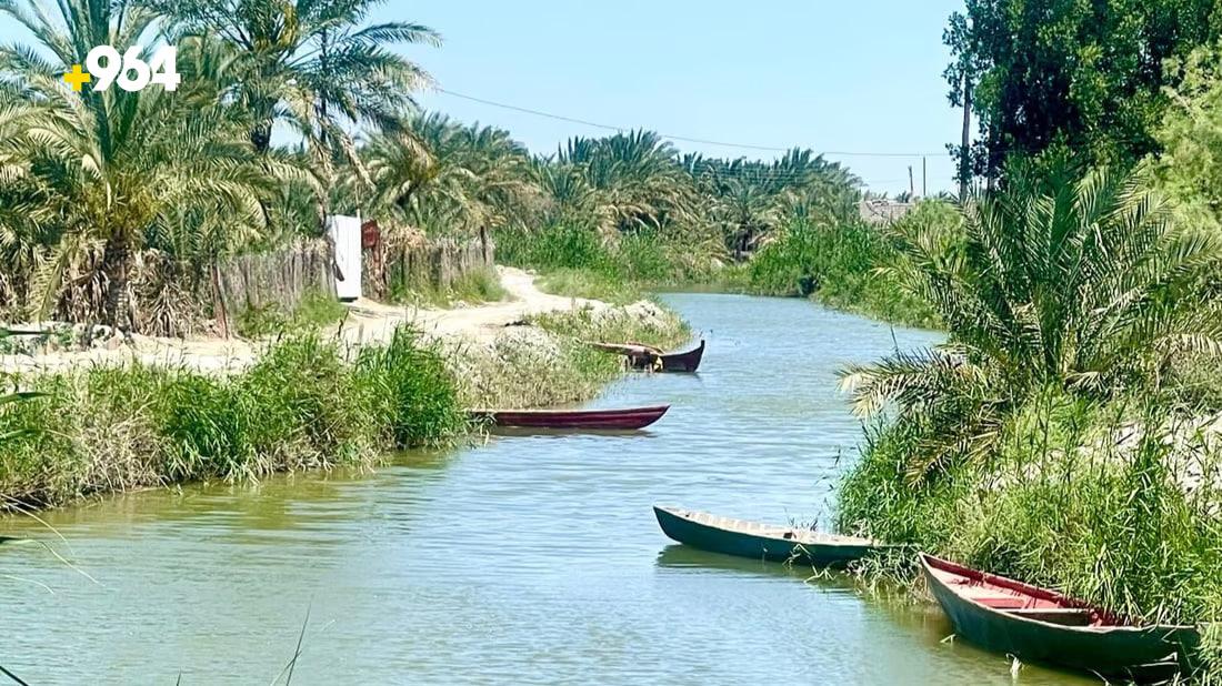Leisure-seekers flock to the banks of Basra’s Dair River as temperatures fall