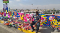 صور من سماء جسر الطوبجي.. رياح خريف بغداد تحلق بطائرات ا...