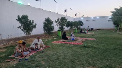 Religious shrine in Dhi Qar draws families looking for green space in absense of a proper park