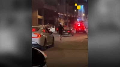 بەڤیدیۆ: کەسێک بە دەمانچەوە لەدەست پۆلیس رادەکات