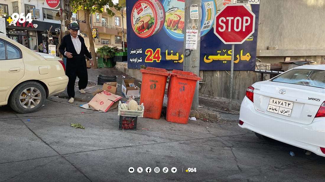 بەردەم یەکێک لە دوکانەکانی شاری سلێمانی. وێنە:964+