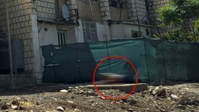 فریاى بکەون؛ ئاوساوە و بەڕووتى لەبەردەم شوقەکانى کارێزە وشک فڕێدراوە