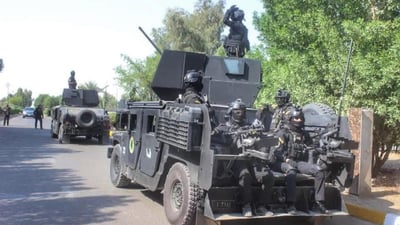 Suspect in killing of Gharraf police officer arrested after shootout